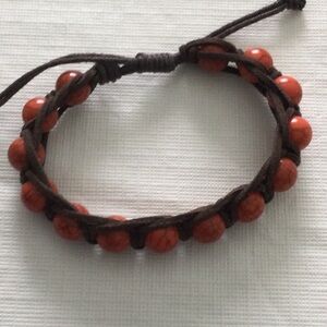 Woman’s Tied Stretch Bracelet made with leather rope and wood beads NWOT